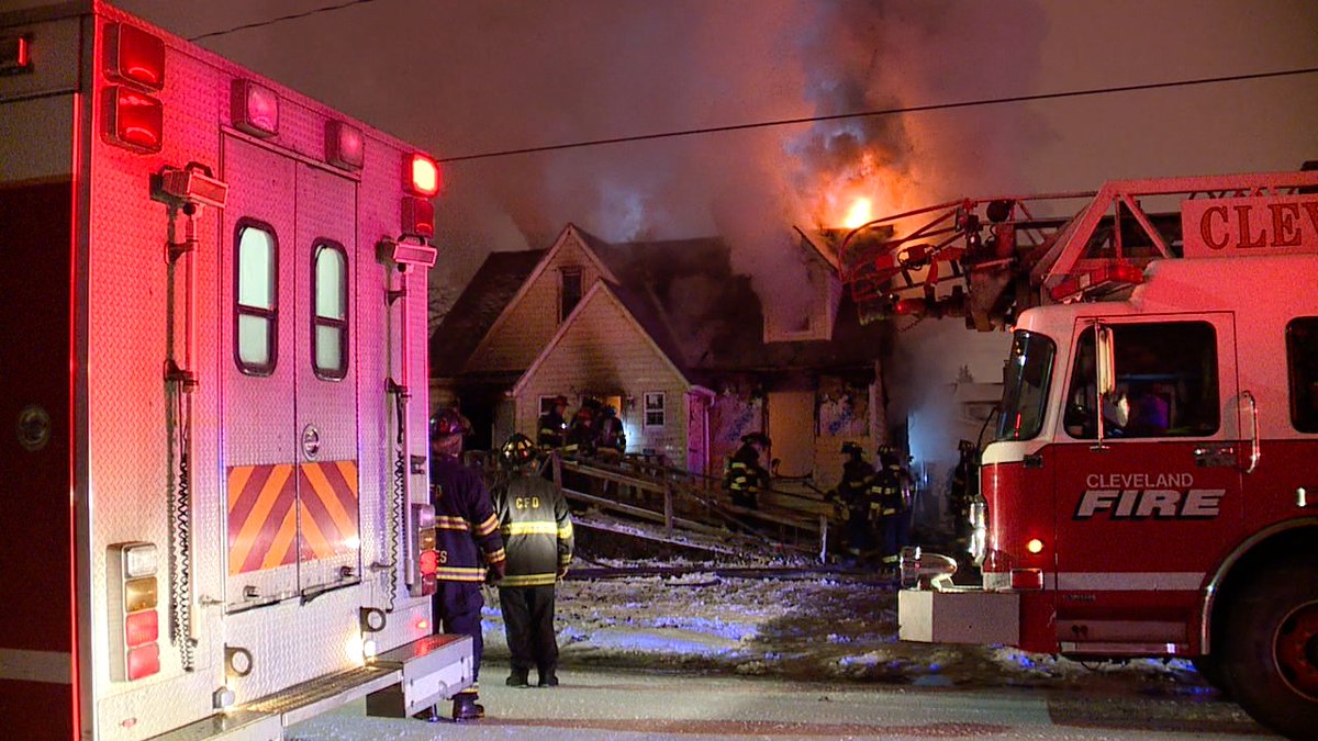 Cleveland fire working a house fire on Wayland Avenue just off West 117th