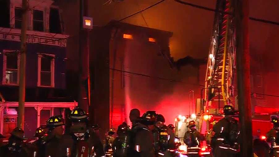 One resident was rescued after a massive fire spread to five homes Monday morning in the Clifton area.