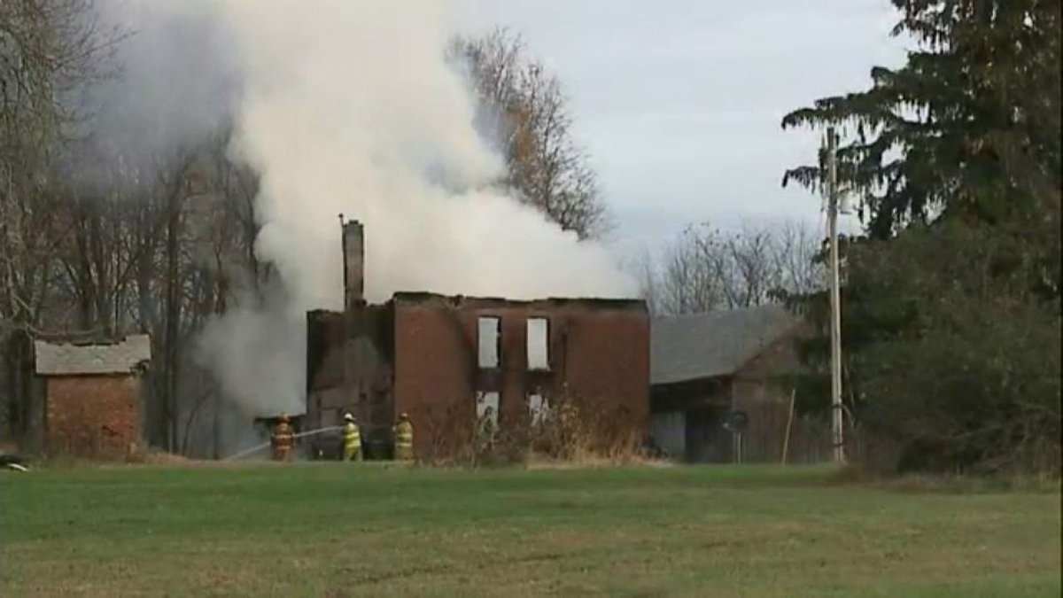 Crews worked Monday to control a fire at a three-story brick structure in Columbiana County.
