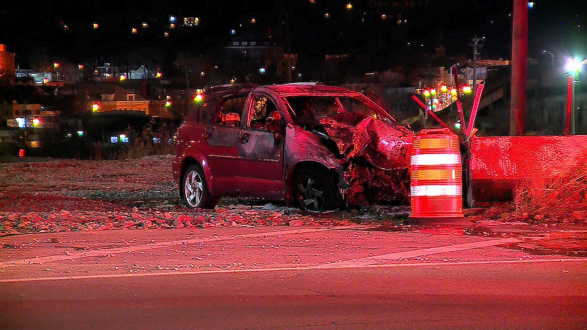 One person transported to hospital after fiery crash into construction barrier on Central Pkwy near Ludlow St.
