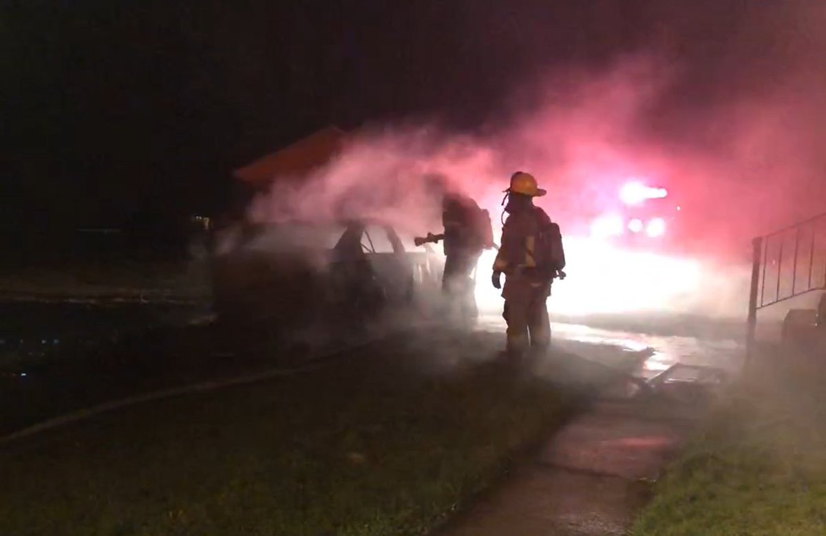 Scene has reported that he can’t see any more flames from the heavily burned car, but it was still smoking.