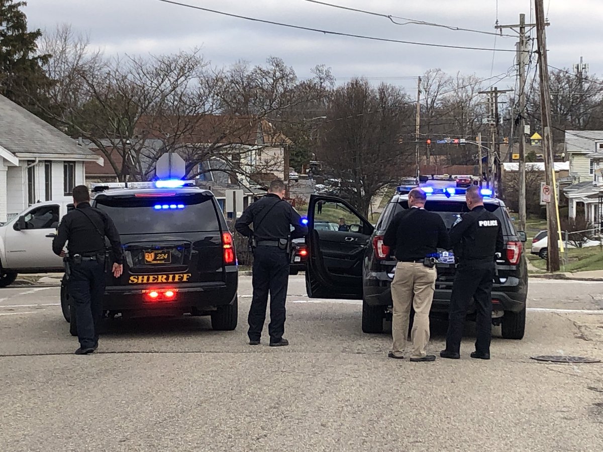 Heavily armed officers are searching around Homes in North College Hill. Looking for a suspect who is believed to have fired at police.
