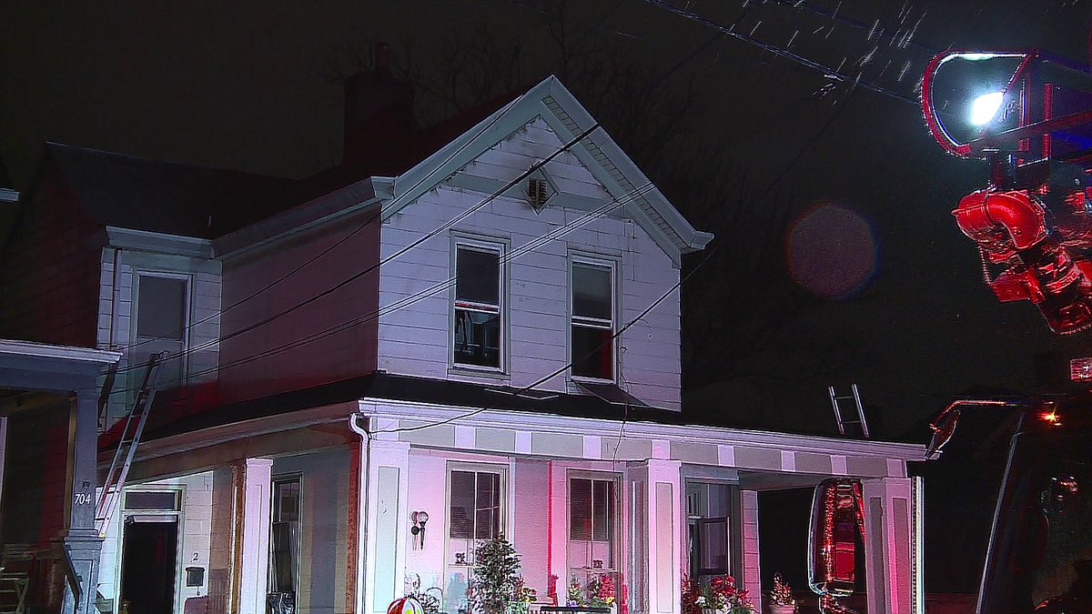 Structure fire 702 Vine Street in Dayton, KY.  Fire contained to left side apartment second floor and attic, one person evacuated. 