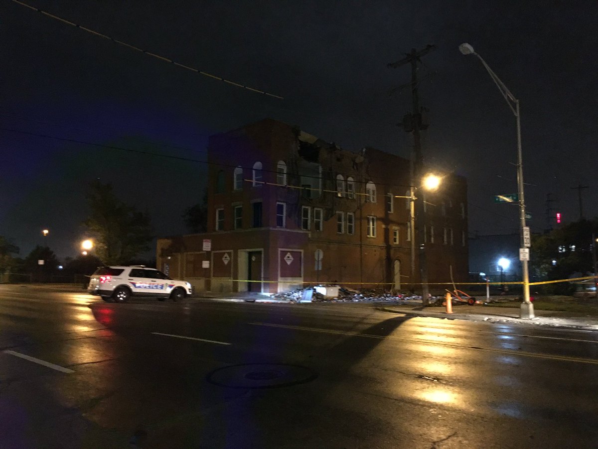 High winds and storms tore part of the side off of this downtown building, leaving a hole in the wall. The building is at the corner of Broad and Grubb St. 