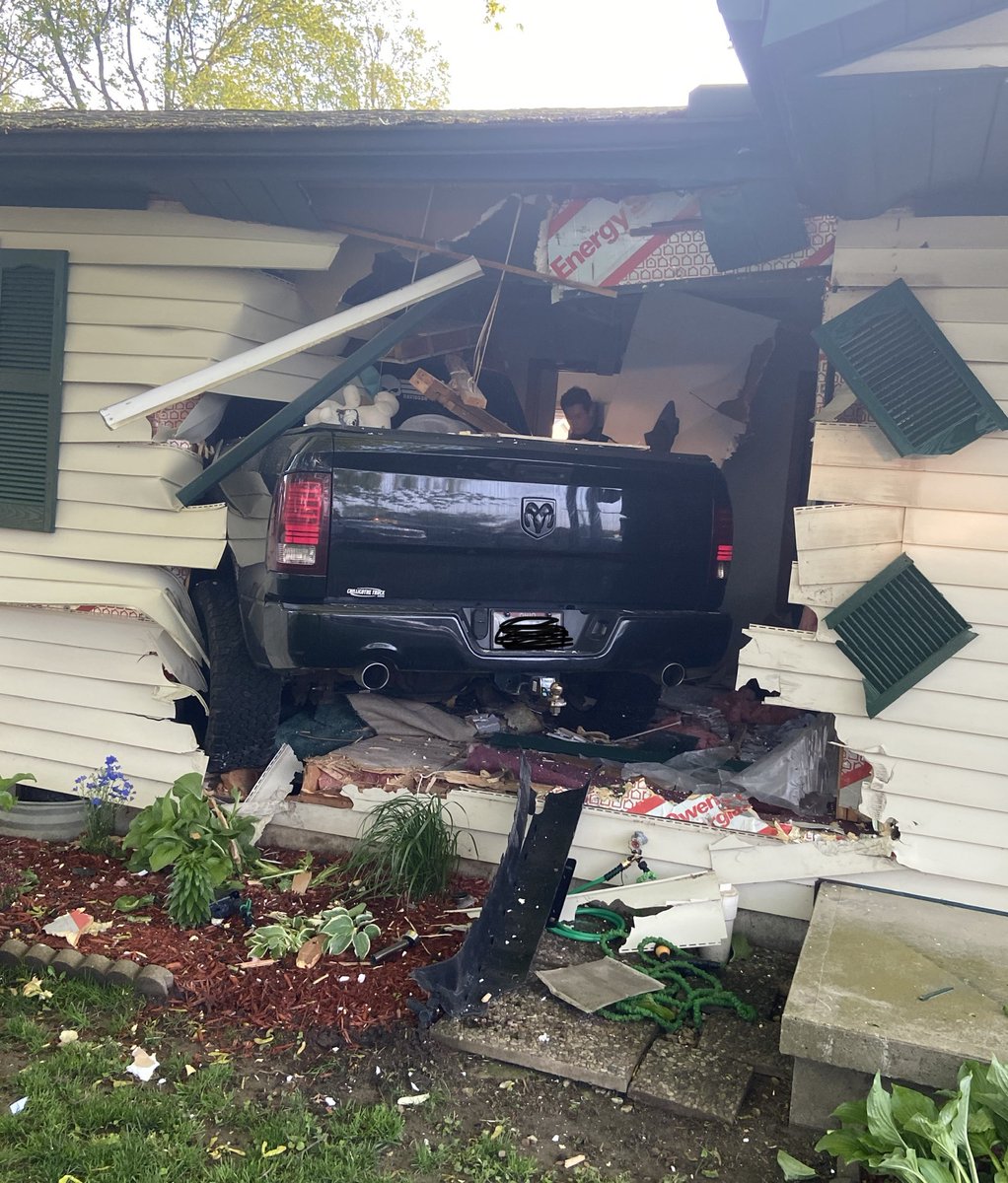 A 15-year-old girl is hurt after a truck crashed into a home in Madison County