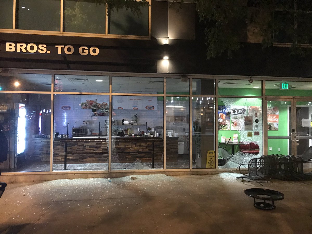 Walked down the street a bit to find more damage at 3rd and Gay. Poke Bros and Latitude 41 have smashed windows.