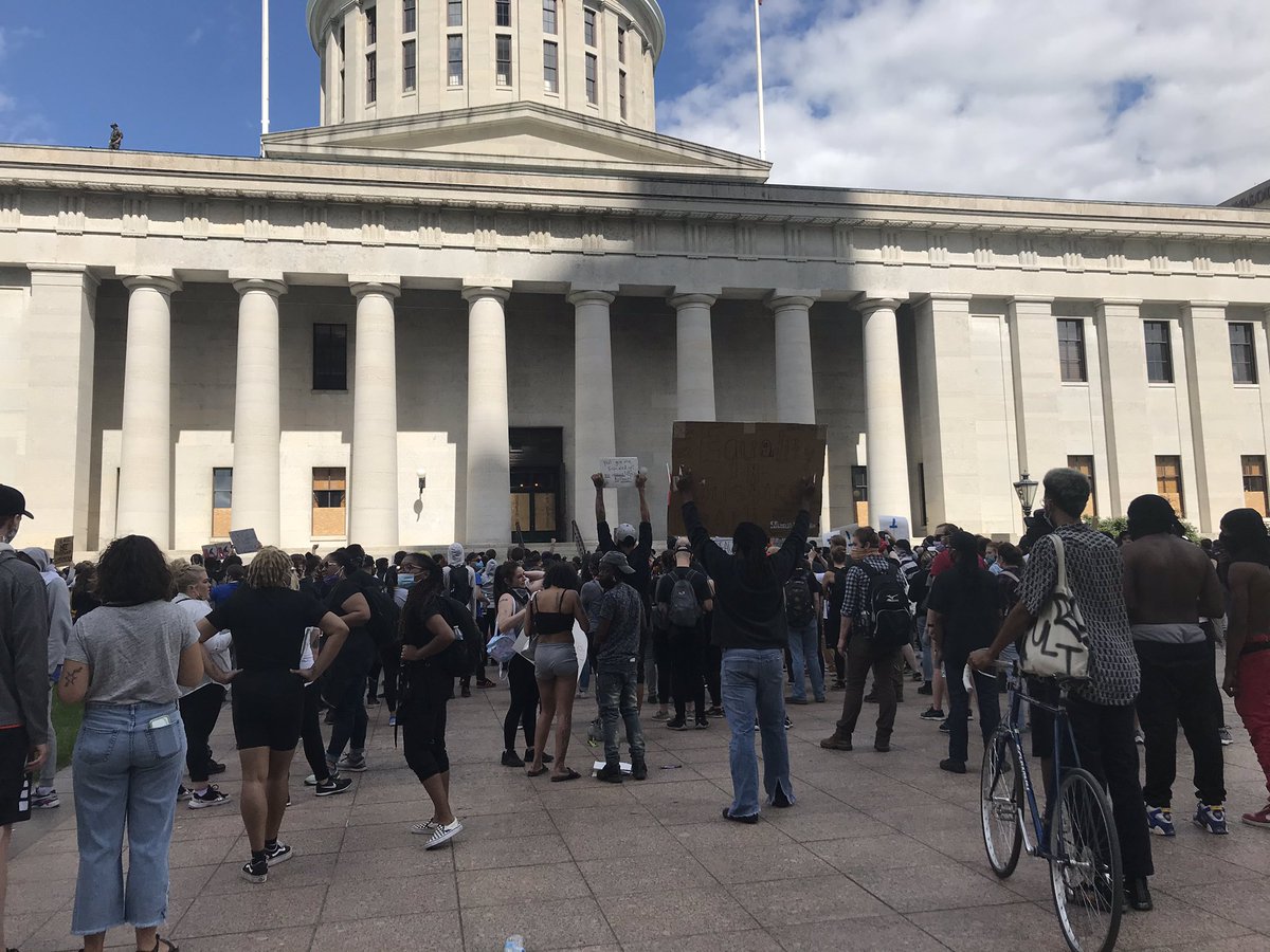 A large group of demonstrators has gathered outside of the @OhioStatehouse