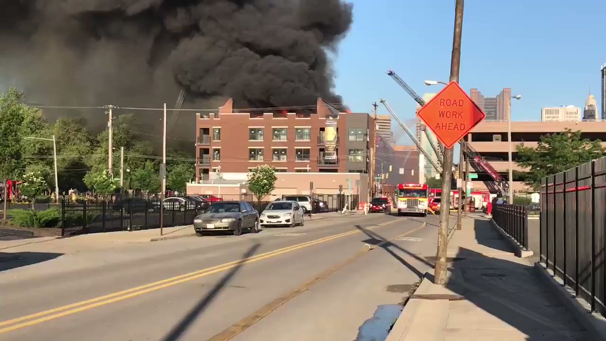Fire crews still working a three alarm fire, continuing to put out at flames at Residenes at Topiary Park