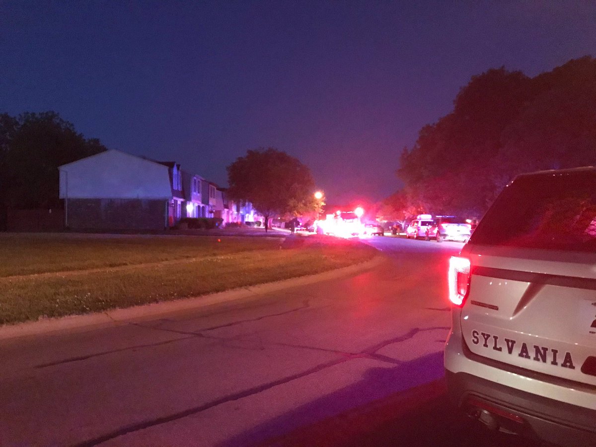 Scene of a possible shooting in Sylvania Township on Black Oak Drive. A neighbor says he heard 5 or 6 shots and police and EMS workers are on the scene.