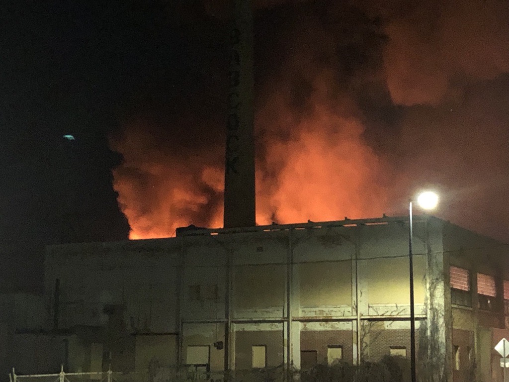 Toledo firefighters are battling a large fire at the former Babcock Dairy facility on Berdan and Martha Avenues. Heavy flames are pouring from the facility and a second alarm was called.