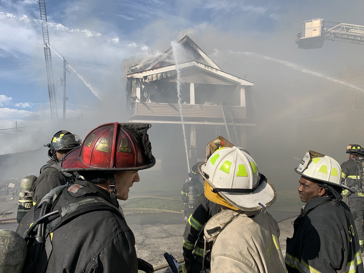 222 Alarm at Kinsman/E.145 in 5th Battalion. Began as fire in Auto Repair Shop. Multiple explosions and fire extended to neighboring occupied house. 11 CLEFIRE Companies on scene. Over 50 firefighters. Crews making progress. No injuries reported