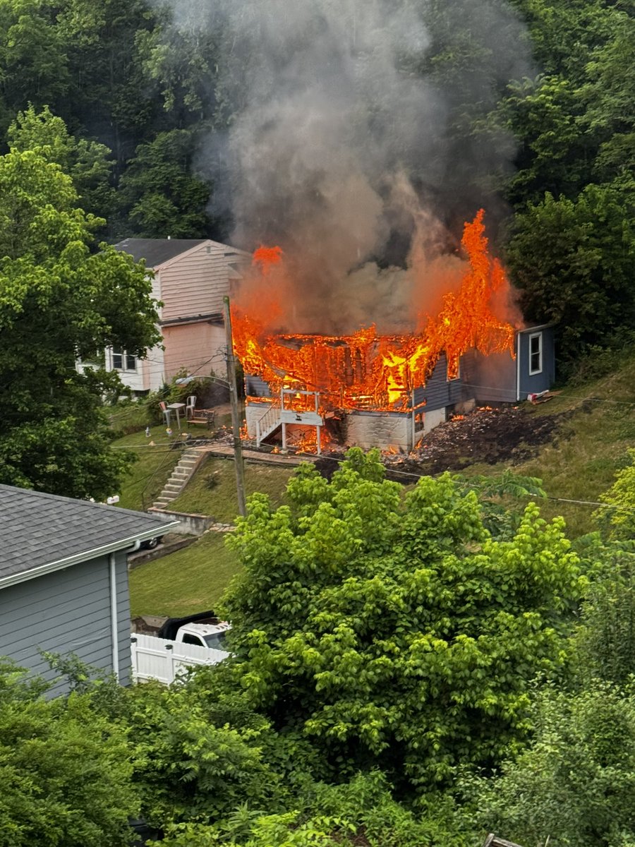 One person is dead after a SWAT stand off ends with an East Westwood home engulfed in flames