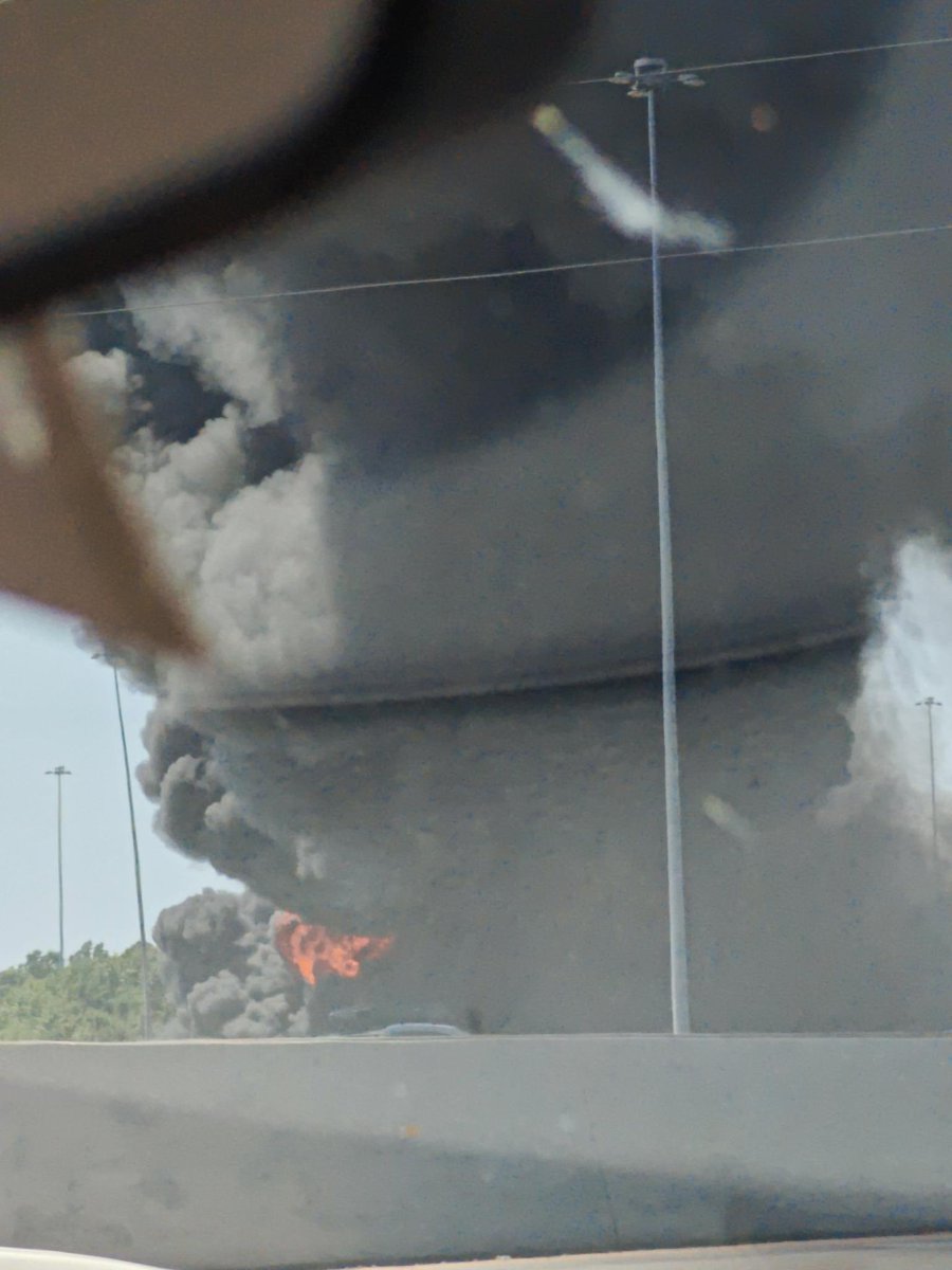 An overturned tanker has caught fire at the interchange of 270 and 161 in Columbus, OH.  .Large fire seen from downtown Columbus  