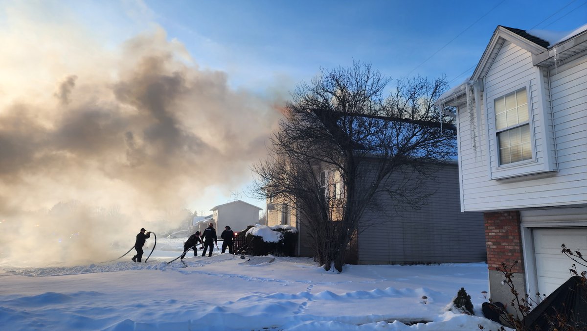 Neighbors hold vigil for woman killed in Trenton house fire