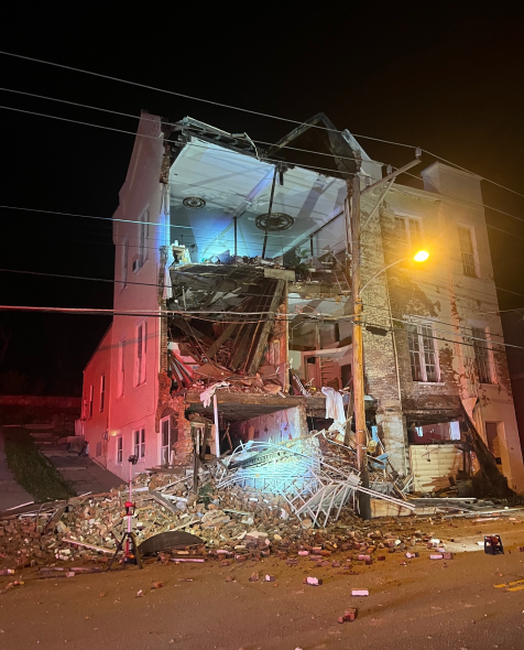 Riverside Drive in East End was closed between Kemper Lane and Collins Avenue after a three-story building partially collapsed